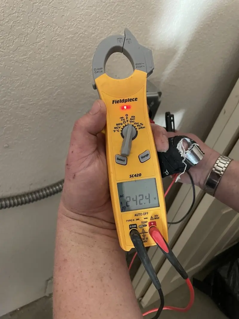 Voltage testing with clamp meter during Generator Installation in Charles Town